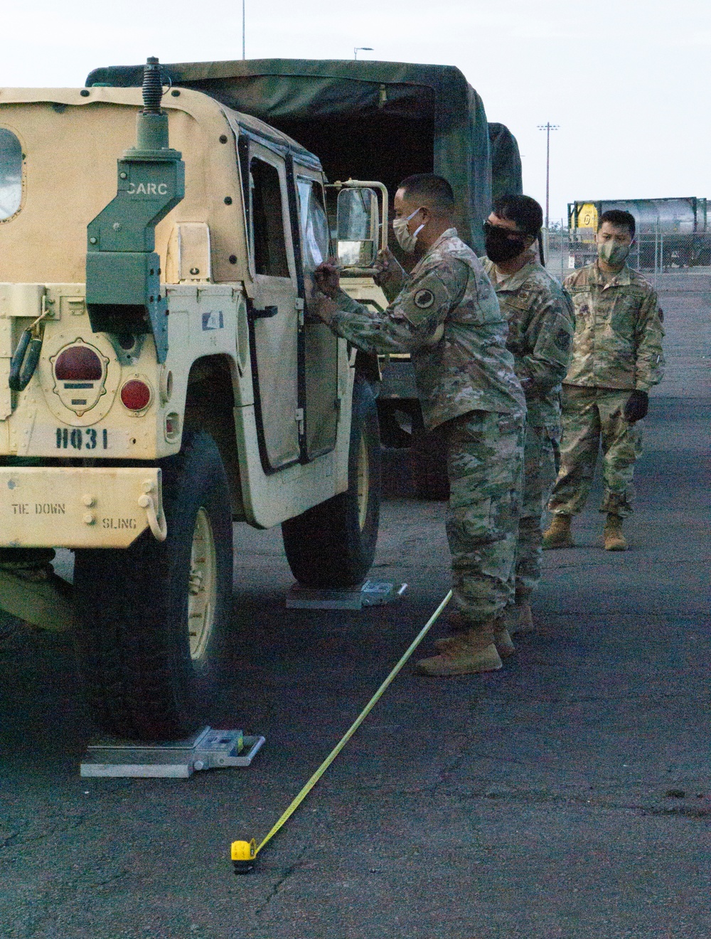 Soldiers and Airmen hold joint inspection for vehicle airlift op