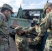 Soldiers and Airmen hold joint inspection for vehicle airlift op