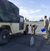 Soldiers and Airmen hold joint inspection for vehicle airlift op