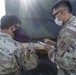 Soldiers and Airmen hold joint inspection for vehicle airlift op