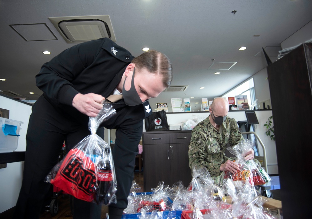 CFAY Delivers Goodie Bags to ROM Sailors