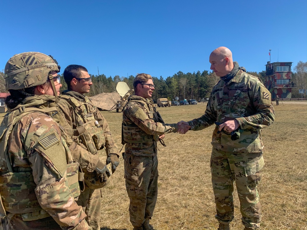 Col. Patrick O’Neal fires an M1 Abrams Tank