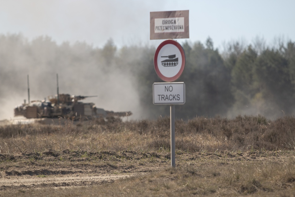 Col. Patrick O’Neal fires an M1 Abrams Tank