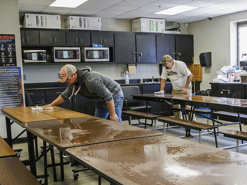 Anniston workers sanitizing break room