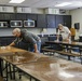 Anniston workers sanitizing break room