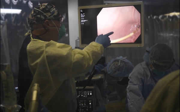 U.S. Navy Doctors, Nurses and Corpsmen Treat Patients in the ICU Aboard USNS Comfort
