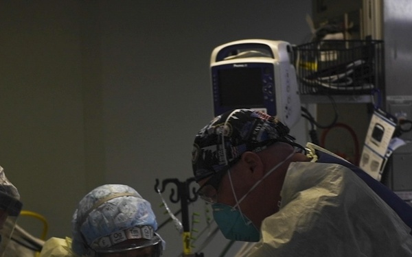 U.S. Navy Doctors, Nurses and Corpsmen Treat Patients in the ICU Aboard USNS Comfort