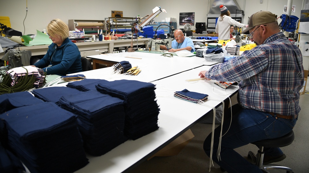 AFE technicians transition from fixing flight equipment to making masks