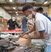 Airmen volunteer to pack food boxes at food bank