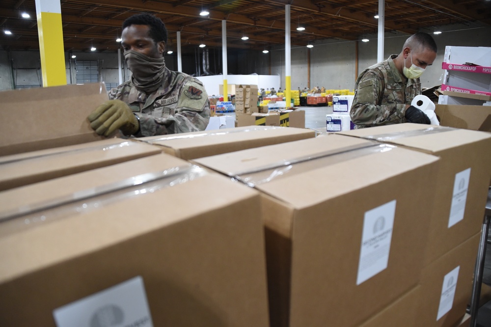Airmen Providing Support, One Box At A Time