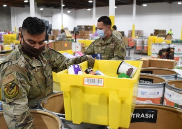 Airmen Providing Support, One Box At A Time