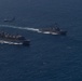 USS Roosevelt, USS Porter, and USNS Supply conduct a PHOTOEX