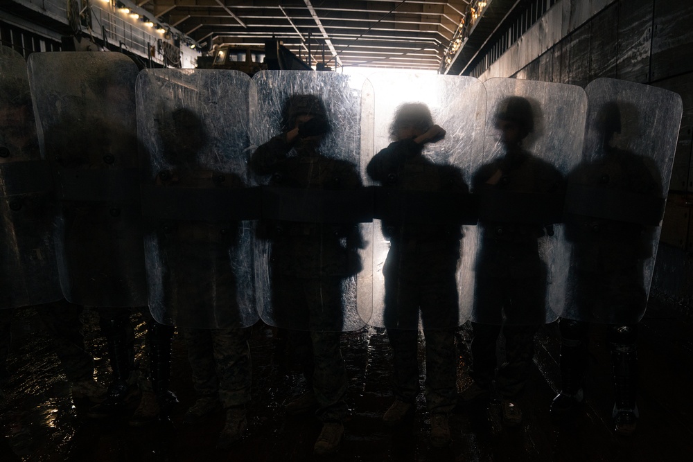 31st MEU Marines conduct riot control training aboard USS Germantown in East China Sea