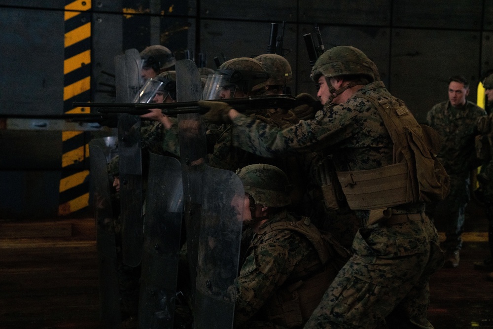 31st MEU Marines conduct riot control training aboard USS Germantown in East China Sea