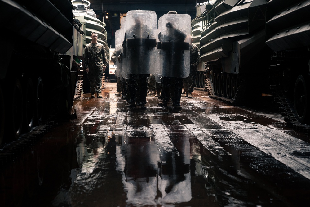 31st MEU Marines conduct riot control training aboard USS Germantown in East China Sea