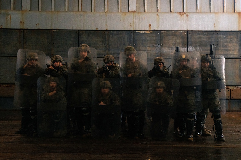 31st MEU Marines conduct riot control training aboard USS Germantown in East China Sea