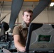 Sailor does maintenance on MH-60S Sea Hawk