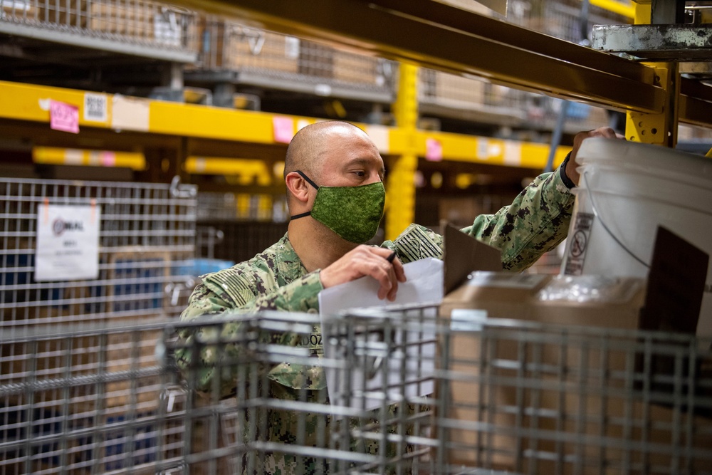 USNS Mercy Sailor Inventories Supplies