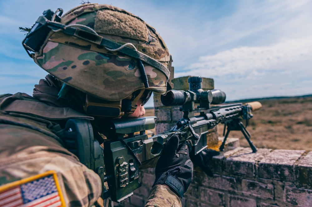 3/2 Soldiers conduct an assault course during NATO BG-P