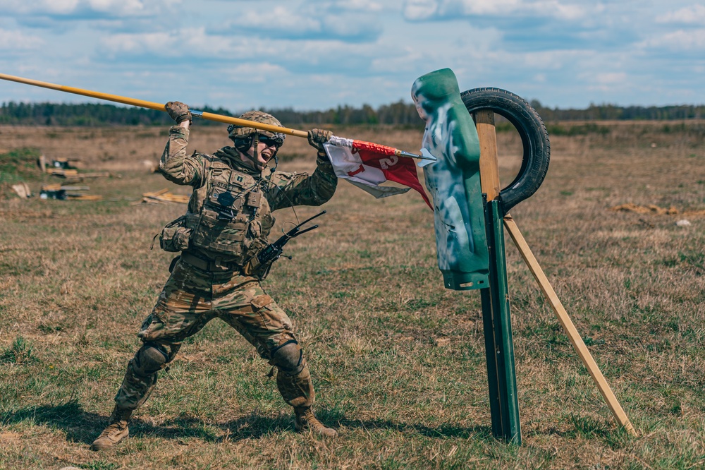 3/2 Soldiers conduct an assault course during NATO BG-P
