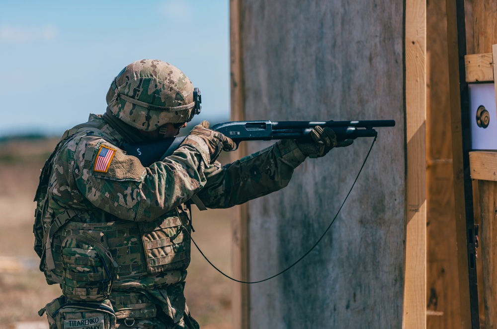 3/2 Soldiers conduct an assault course during NATO BG-P