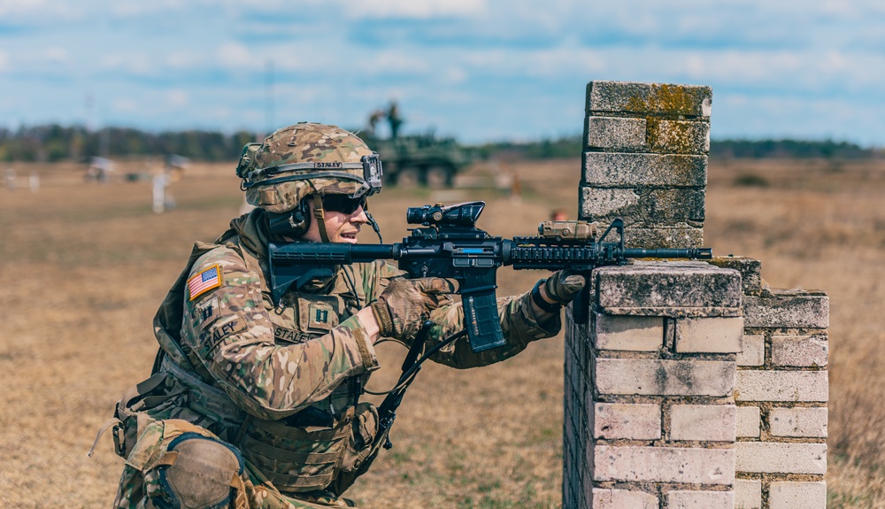 3/2 Soldiers conduct an assault course during NATO BG-P