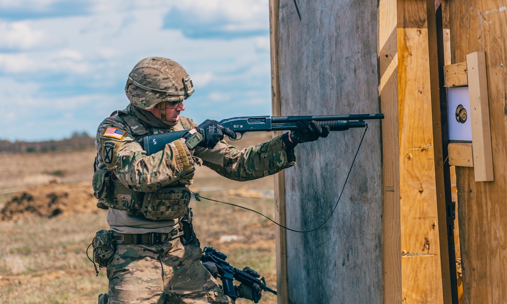 3/2 Soldiers conduct an assault course during NATO BG-P