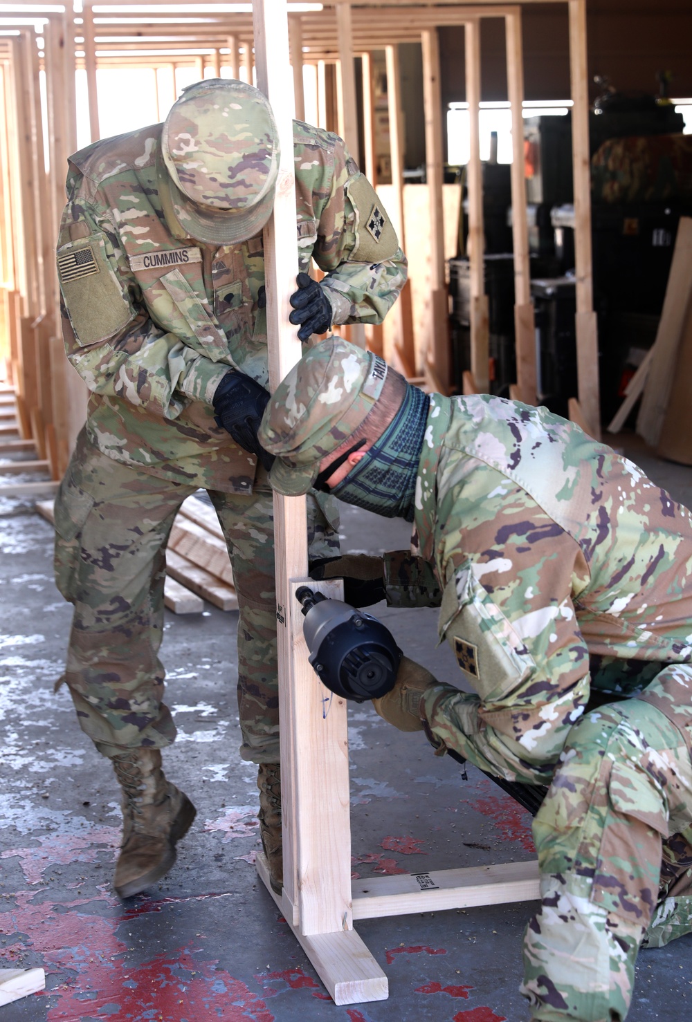 Creating safe spaces Soldiers build partitions for isolated patients