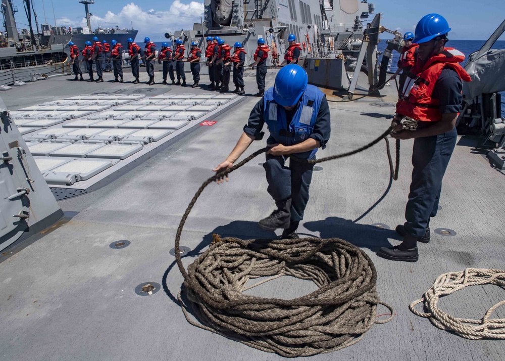 USS Mustin Conducts Replenishment at sea