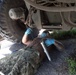 U.S. Navy Seabees with NMCB-5’s Detail Tinian build Southwest Asian huts