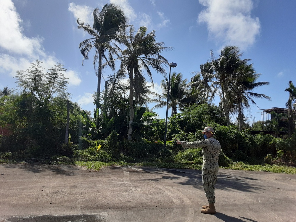 U.S. Navy Seabees with NMCB-5’s Detail Tinian build Southwest Asian huts