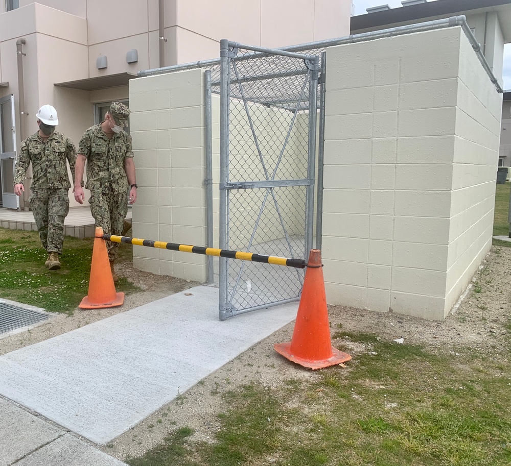 U.S. Navy Seabees with NMCB-5’s Detail Iwakuni inspect new environmental enclosures