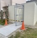 U.S. Navy Seabees with NMCB-5’s Detail Iwakuni inspect new environmental enclosures