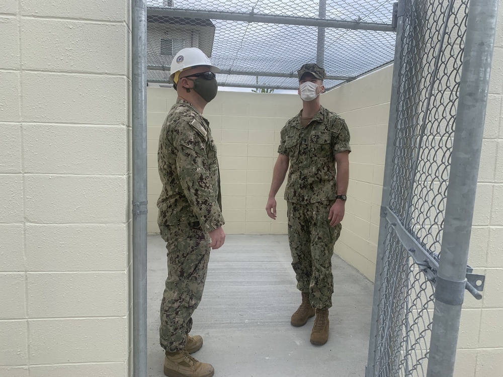 U.S. Navy Seabees with NMCB-5’s Detail Iwakuni inspect new environmental enclosures