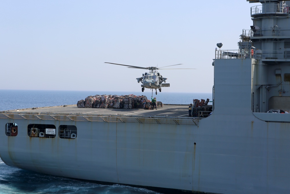 USS Oak Hill receives supplies during vertical replenishement-at-sea