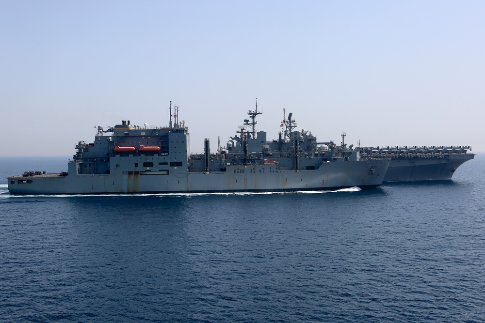 USS Bataan transits alongside USNS Robert E. Peary