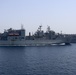 USS Bataan transits alongside USNS Robert E. Peary