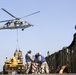 USS Oak Hill receives supplies during vertical replenishement-at-sea