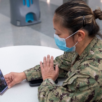 U.S. Navy siblings connect during COVID-19 response.