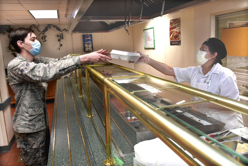 Dining facilities still serving Airmen with carry out meals