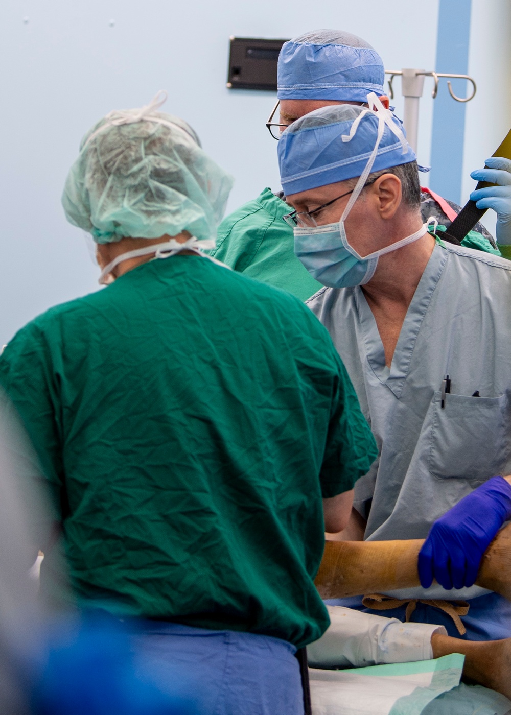 USNS Mercy Sailors Prepare Patient for Surgery