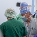 USNS Mercy Sailors Prepare Patient for Surgery