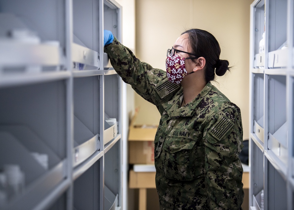 USNS Mercy Sailor Inventories Medicine