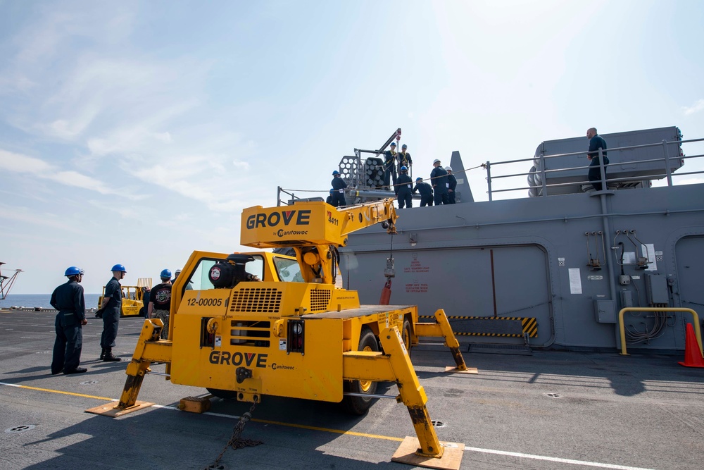 USS America (LHA 6) conducts crane operations