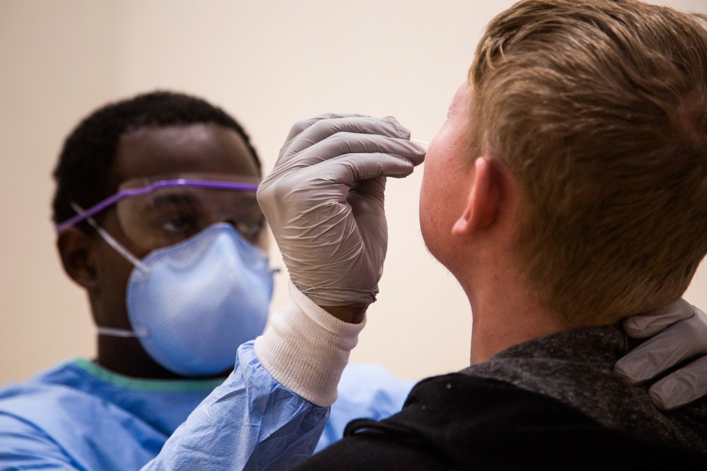 3rd Medical Battalion Corpsmen Conduct Second Swab on USS Theodore Roosevelt Sailors