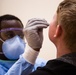 3rd Medical Battalion Corpsmen Conduct Second Swab on USS Theodore Roosevelt Sailors