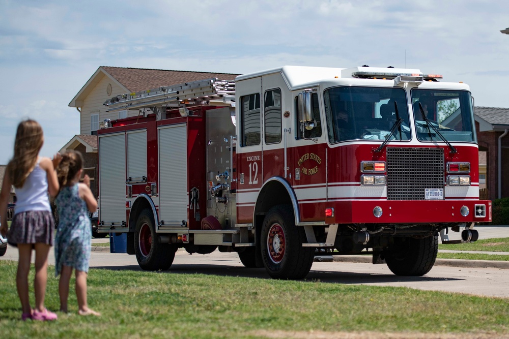 97 AMW concludes Month of Military Child with base parade