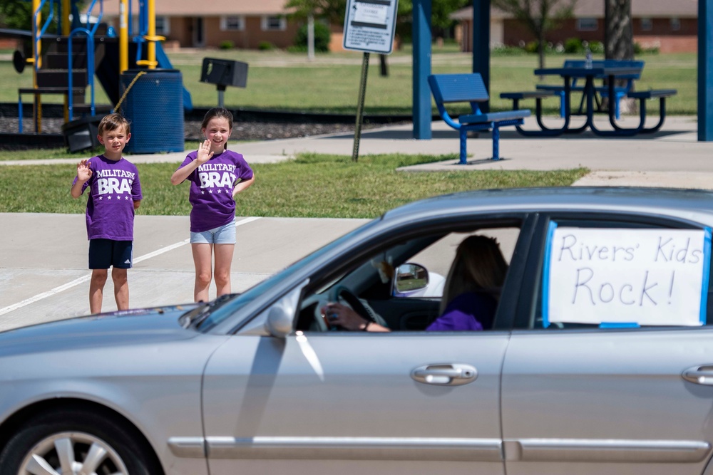 97 AMW concludes Month of Military Child with base parade