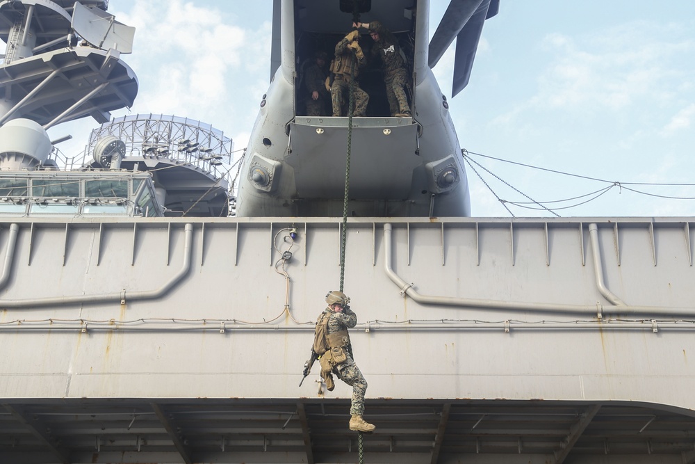 Fox Company executes fast-roping, live-fire training aboard USS Bataan