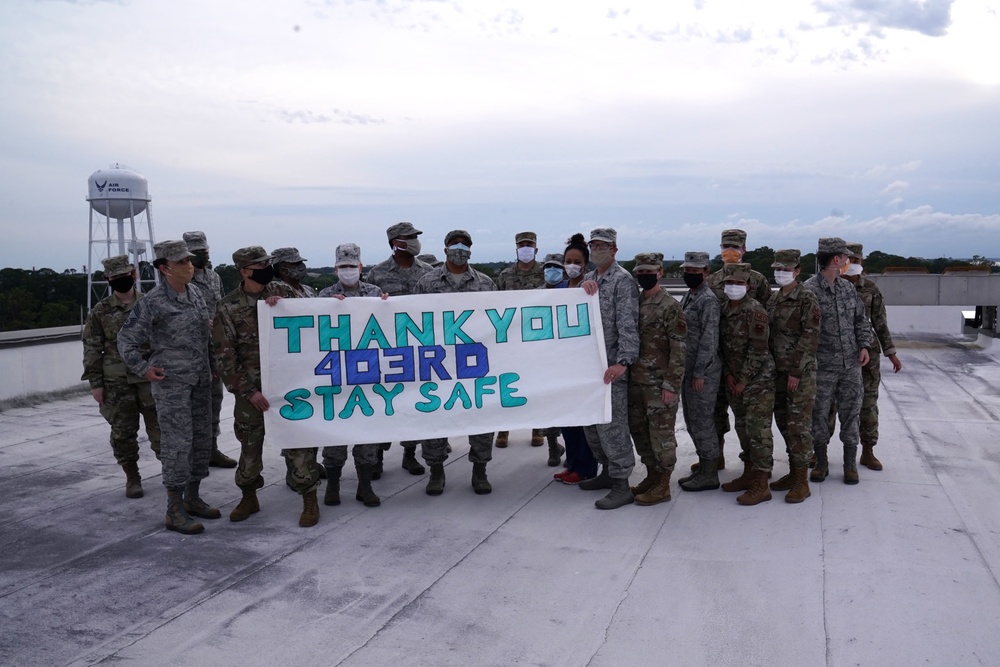 403rd Wing honors medical personnel with flyover